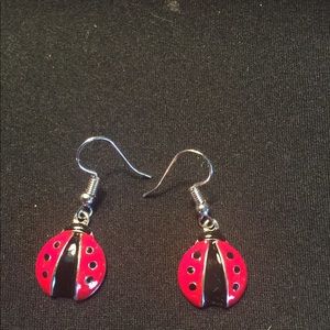 Brand new ladybug metal earrings
